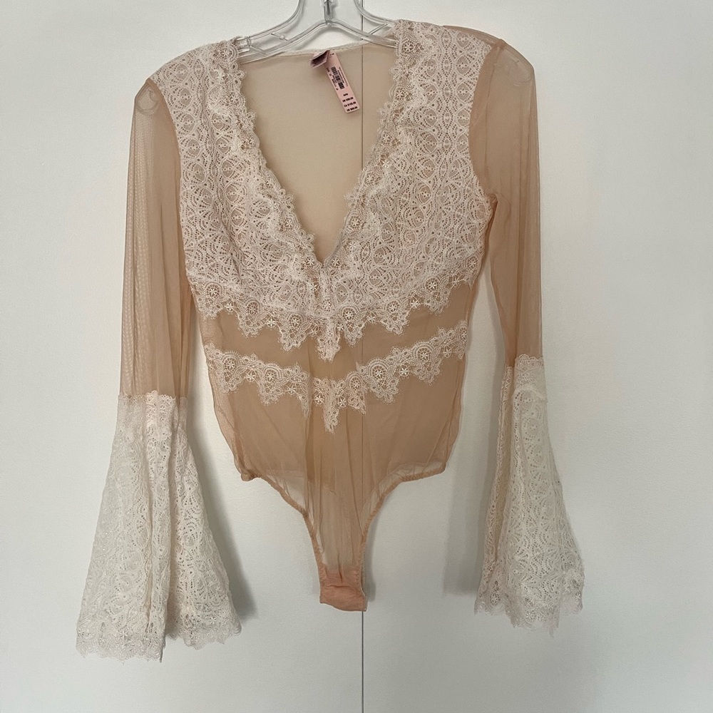 NWT Sheer Pink with white lace sleeves Victoria Secret bodysuit.